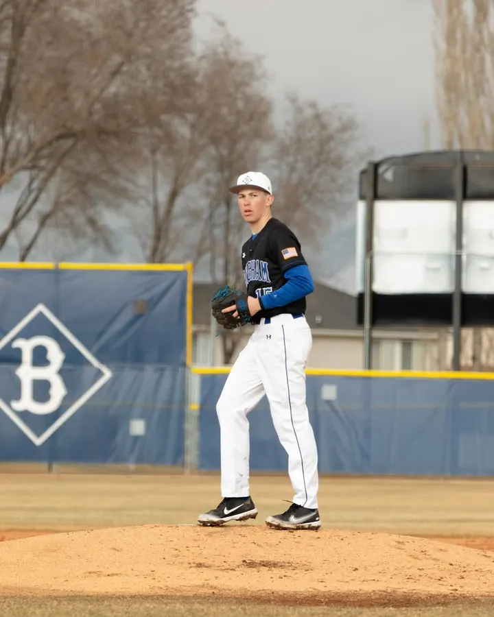 Boston on the mound in a white uniform