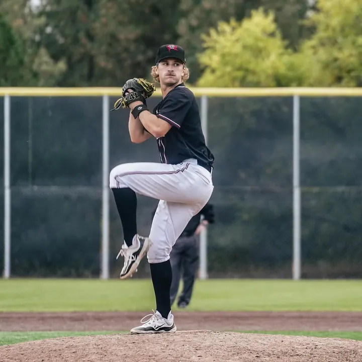 Tyler at leg lift on the mound
