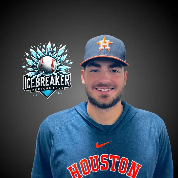 Coach Ice smiling in a Houston Astros cap and hoodie